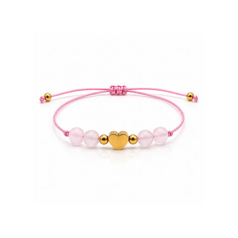 Bracelet cœur doré en quartz rose 6 mm entier, quatre pierres et cordon rose sur fond blanc