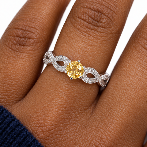 Bague réglable en argent 925 rhodié et citrine facettée : échelle sur le doigt