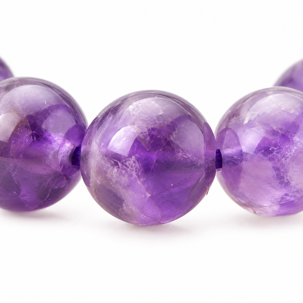 Bracelet en améthyste 6 mm taille 0 : perle polie et transparence
