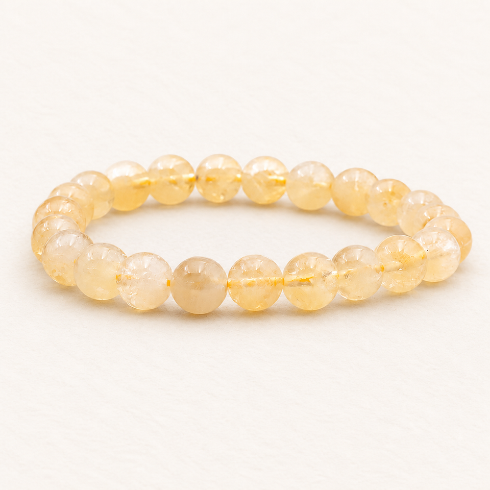 Bracelet en citrine chauffée 8 mm - 16 à 18 cm sur fond Nacre MilAura