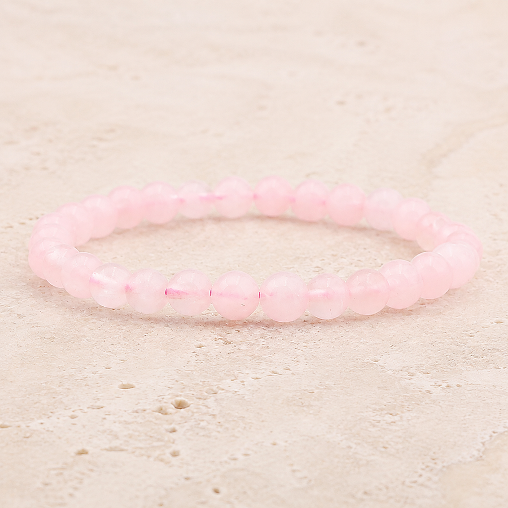 Bracelet en quartz rose à perles de 6 mm sur pierre claire