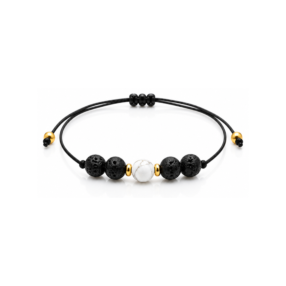 Bracelet doré en howlite et pierre de lave 6 mm, vue complète sur fond blanc pur avec construction et réglage visibles