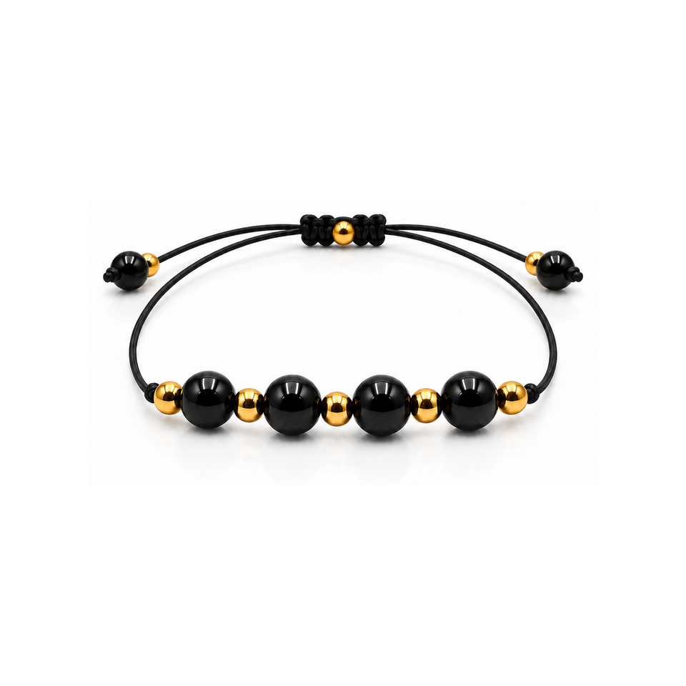 Bracelet doré en obsidienne noire 6 mm, vue complète sur fond blanc pur avec construction et réglage visibles