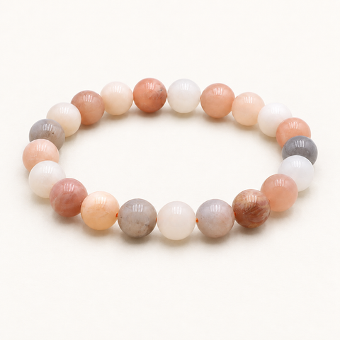 Bracelet en pierre de lune multicolore 10 mm - 16 à 18 cm sur fond Nacre MilAura