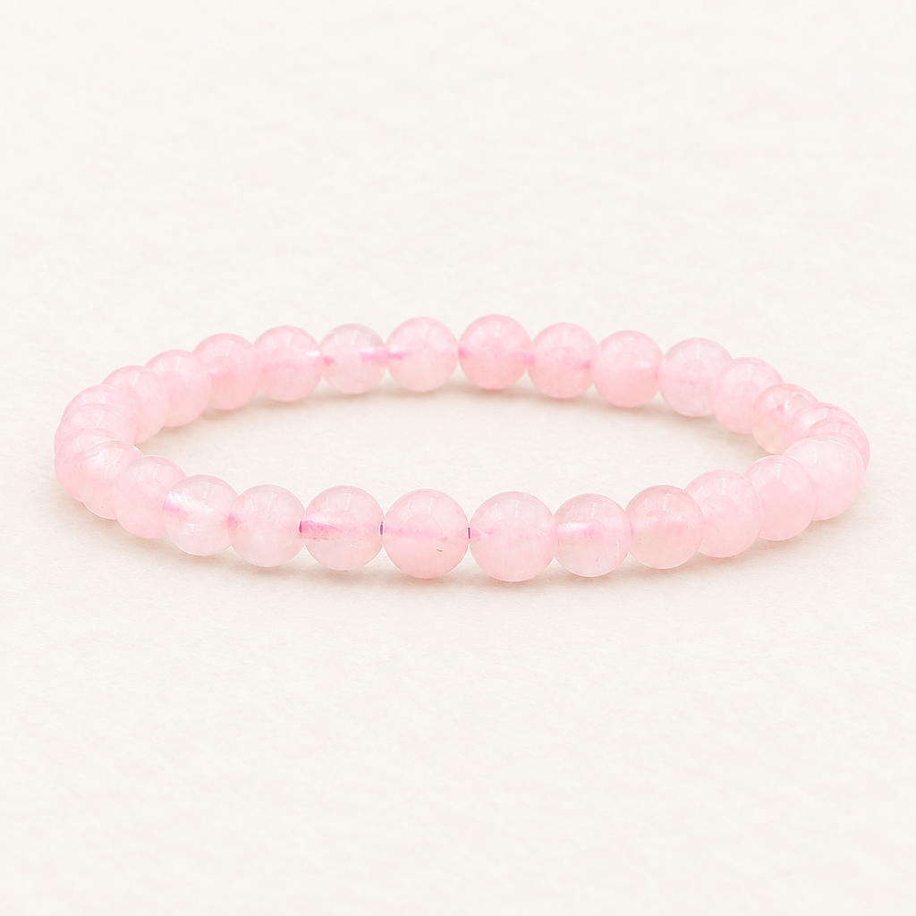 Bracelet en quartz rose du Brésil 6 mm - 16 à 18 cm sur fond Nacre MilAura