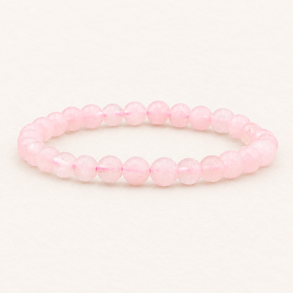 Bracelet en quartz rose du Brésil 6 mm - 16 à 18 cm sur fond Nacre MilAura
