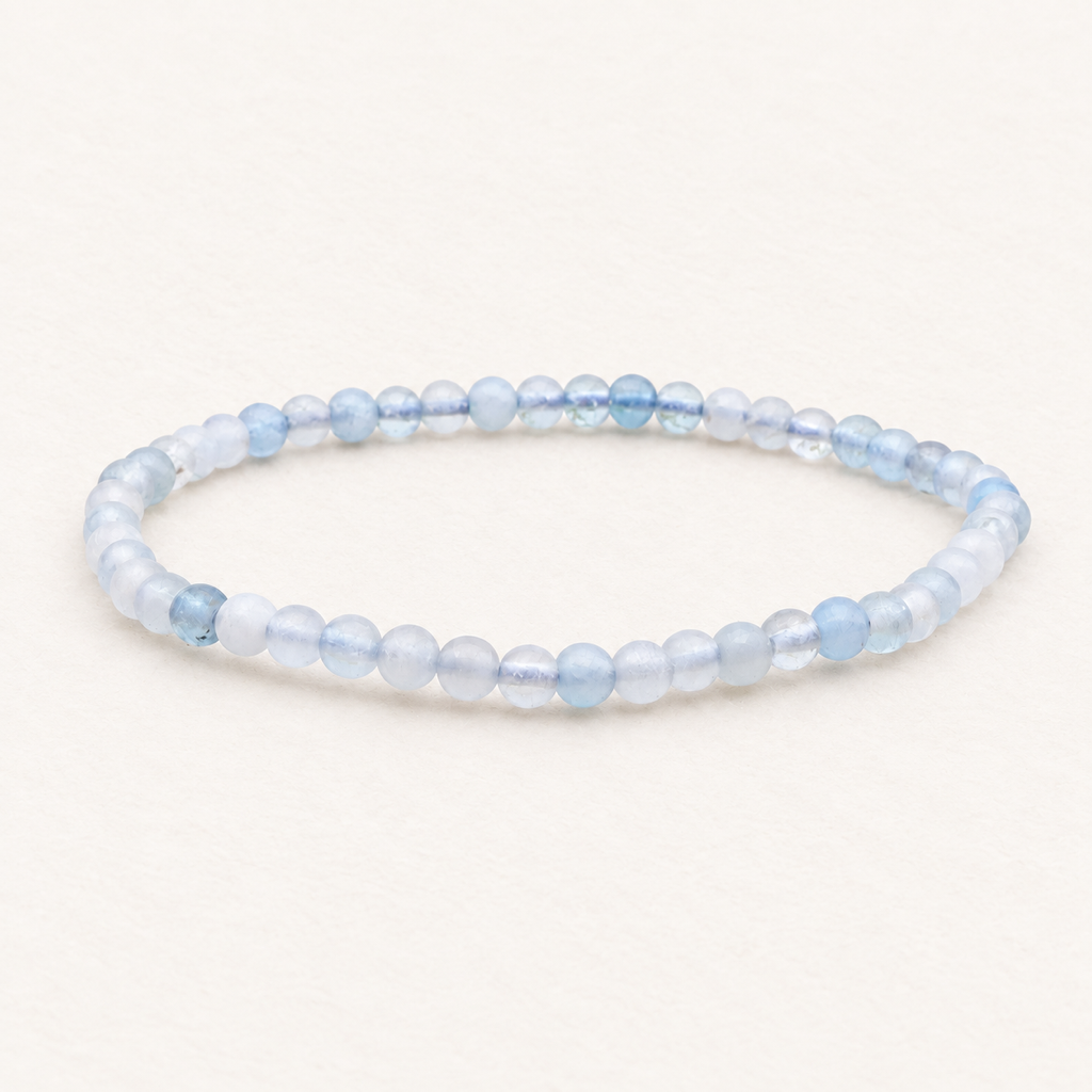 Bracelet en aigue-marine 4,5 à 5,5 mm - 16 à 18 cm sur fond Nacre MilAura