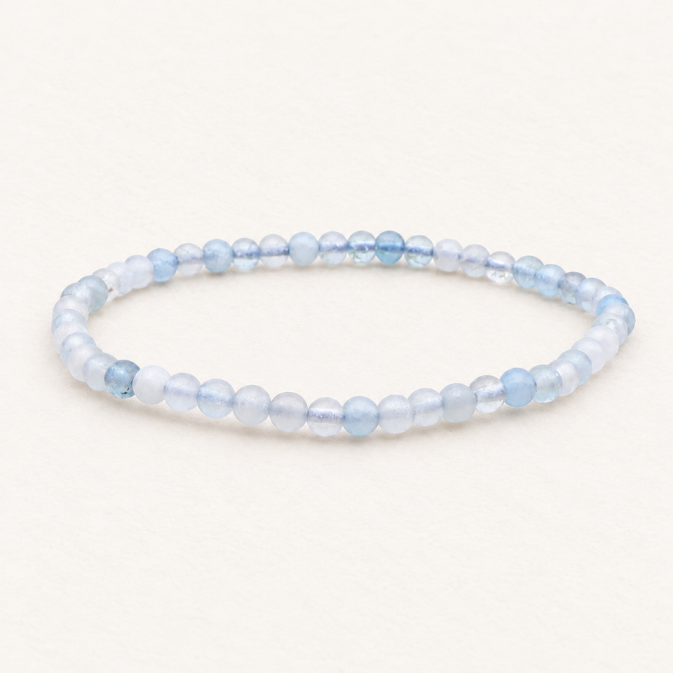 Bracelet en aigue-marine 4,5 à 5,5 mm - 16 à 18 cm sur fond Nacre MilAura