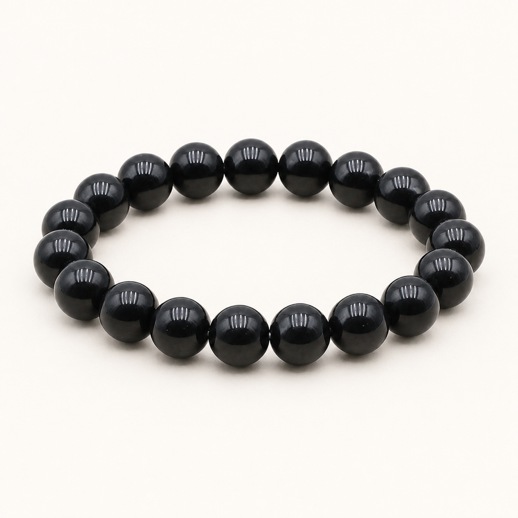 Bracelet en obsidienne noire 10 mm - 16 à 18 cm sur fond Nacre MilAura