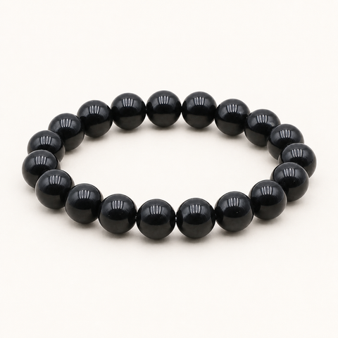 Bracelet en obsidienne noire 10 mm - 16 à 18 cm sur fond Nacre MilAura