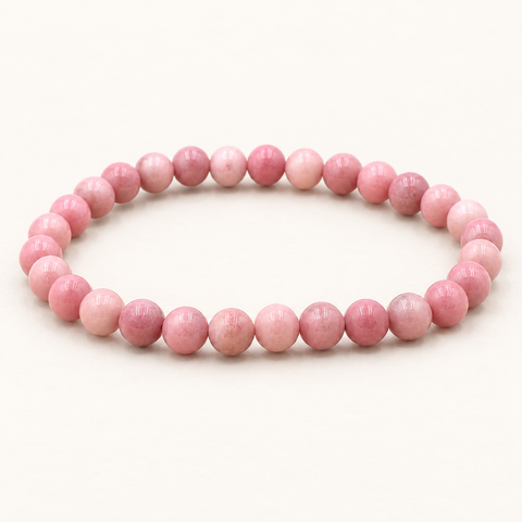 Bracelet en rhodonite d'Australie 6 mm - 16 à 18 cm sur fond Nacre MilAura