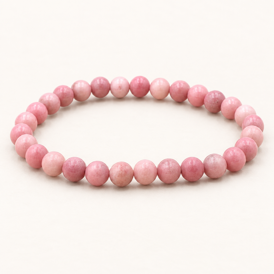 Bracelet en rhodonite d'Australie 6 mm - 16 à 18 cm sur fond Nacre MilAura