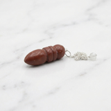 Pendule Jaspe Rouge — Photo produit sur marbre
