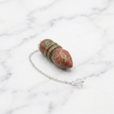 Pendule Unakite — Photo produit sur marbre