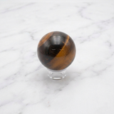 Sphère Œil de Tigre — Photo produit sur marbre