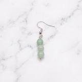 Boucles d'Oreilles Aventurine — Photo produit sur marbre