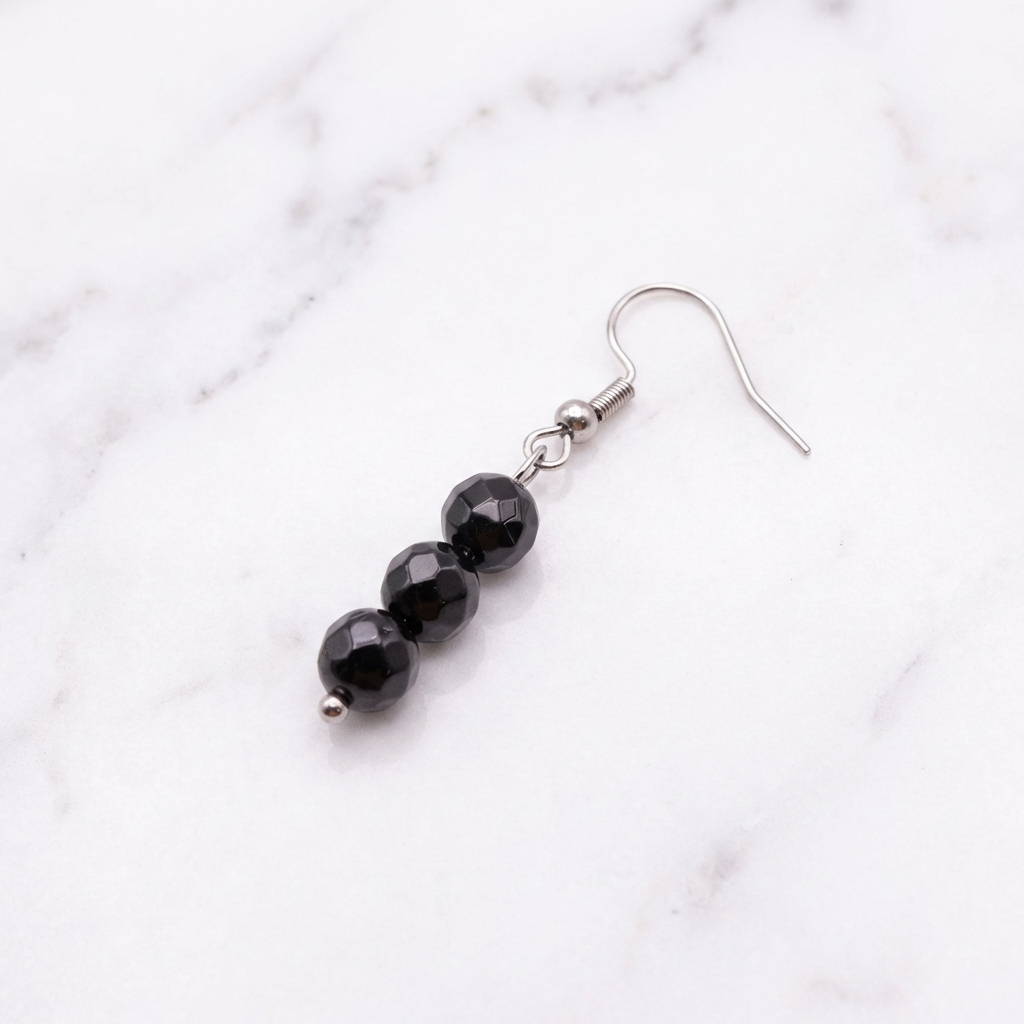 Boucles d'Oreilles Obsidienne — Photo produit sur marbre