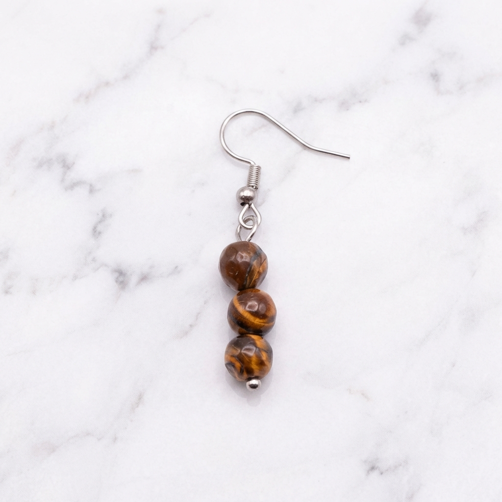 Boucles d'Oreilles Œil de Tigre — Photo produit sur marbre