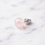 Boucles d'Oreilles Quartz Rose — Photo produit sur marbre